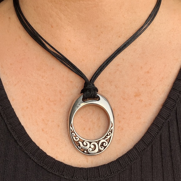 Brighton Jewelry - Brighton Eclipse Necklace Black Cord Silvertone Oval Filigree Pendant 15”